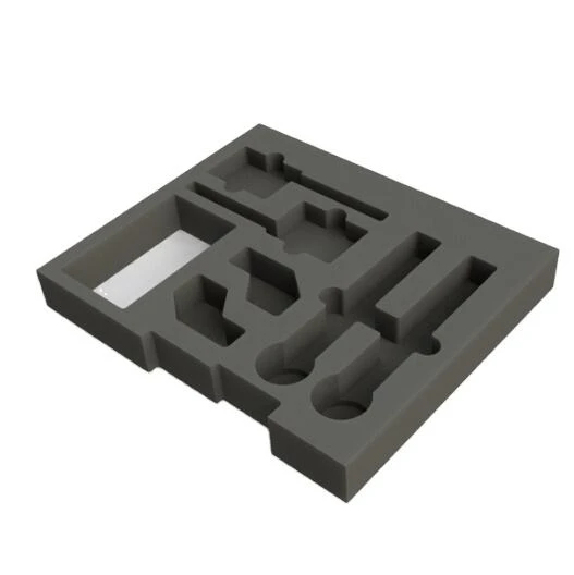 Custom cut foam packaging insert with shaped compartments
